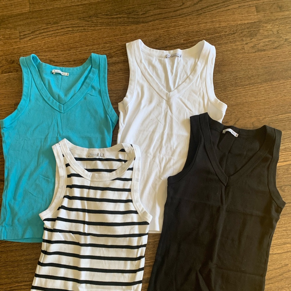 4 one size fits all Michael Stars V-neck tanks. One for 65 or all 4 for $250.
